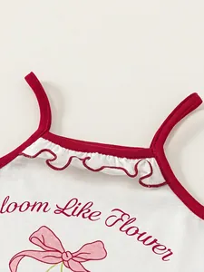 Débardeur fille en coton blanc avec bordure rouge, imprimé floral et nœud rose