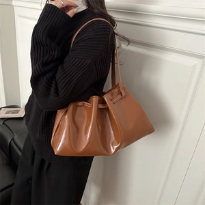 Brown glossy faux leather pleated tote bag with drawstring for women's daily commute