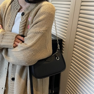 Vintage black lychee leather crossbody pillow bag with gold chain strap for women