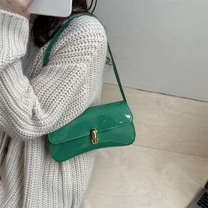 French retro bright green patent leather baguette bag with golden buckle for women
