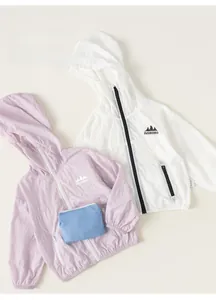 Detail of lightweight hooded sun protection jackets with portable storage bag and zipper pockets