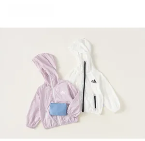 Detail of thin hooded sun protection jackets with a portable storage bag for kids