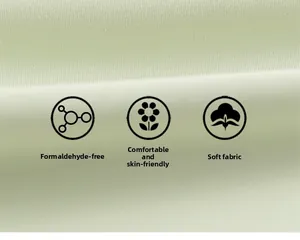 Gros plan sur un tissu en coton vert clair doux avec des icônes de textile sain