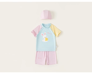Macro detail of the cute bunny print and pastel color blocks on children's swimwear set