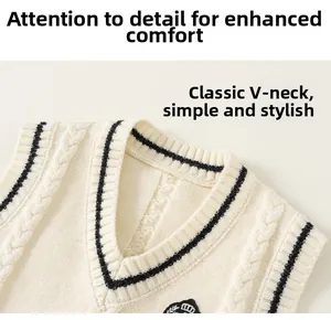 Detail of cable knit texture and V-neck with black stripes on off-white sweater vest