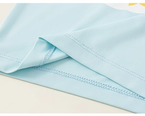 Detail of light blue knitted fabric showing double-needle flat-seam and fine texture