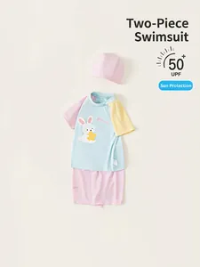 Kids' three-piece cartoon bunny swimwear with short sleeve top, shorts and swimming cap