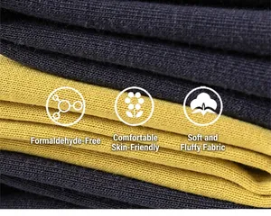 Détail macro du tricot côtelé doux noir et jaune pour sweats à capuche enfants
