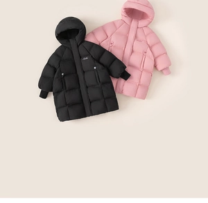 Detail of children's hooded down jacket showing quilted fabric and ribbed windproof cuffs