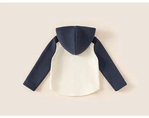 Back view of children's hooded sweatshirt featuring contrast navy sleeves and cream body
