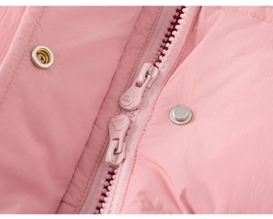 Detail of pink waterproof puffer coat with high-quality zipper and metal snap button