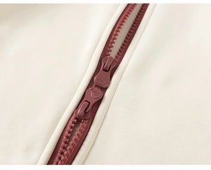 Macro detail of high-quality dual two-way zippers on children long-sleeve cotton jacket