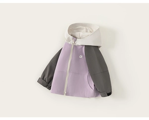 Detail of color-block kids outdoor hooded jacket with letter logo and velcro cuffs
