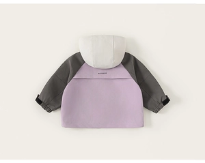 Detail showing the windproof fabric and ALLFORKIDS logo on this girls outdoor jacket