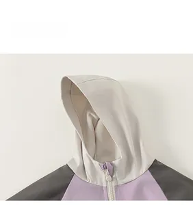 Detail view of children hoodie jacket with tricolor windproof stitching and zipper