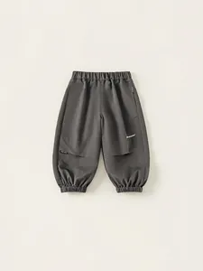 Boy's grey cargo pants with elastic waist and jogger cuffs for casual spring wear