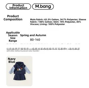 Detail showing navy sweatshirt with dachshund patch and blue plaid sleeves for girls