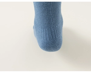 Close-up of blue mesh cotton socks featuring breathable ribbed knitting and heel details