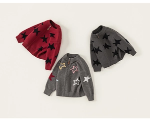 Three children's knit zip-up sweaters with star patterns in red and grey colors