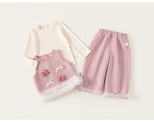 Detail of pink tweed vest three-piece set with mesh lace hem for little girls