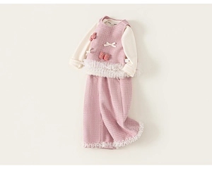 Flat lay detail of toddler girl three-piece pink tweed set with bow and lace trim