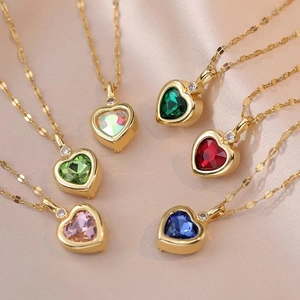 Elegant heart-shaped gemstone necklace in multiple colors with a delicate gold chain