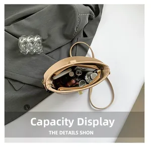 Overhead view showing storage capacity for essentials in the woven beige bucket bag