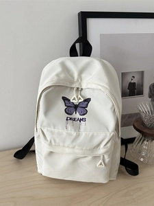 Weißer Freizeitrucksack für Schüler mit lila Schmetterlingsdruck und DREAMS-Aufdruck