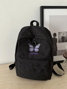 Süßer schwarzer Schulrucksack mit lila Schmetterling und Dreams Text für Schüler