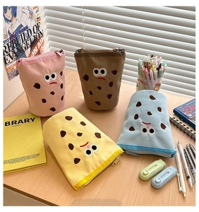 Standing canvas pencil cases with cartoon embroidery in multiple vibrant colors