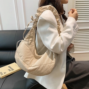 Chic pleated cream hobo bag with drawstring and bow shoulder strap detail for women