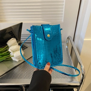 Electric blue glossy patent leather mini crossbody phone bag with embossed crocodile texture