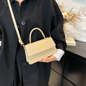 Minimalist beige leather handbag with Fashion print and adjustable shoulder strap