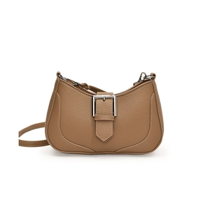 Brown lychee leather crescent shoulder bag with silver buckle and crossbody strap