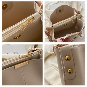 Detailed views of beige bucket bag showing interior zipper, magnetic clasp and gold hardware