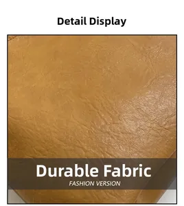 Detailed view of ginger leather bag featuring wear-resistant lychee grain texture