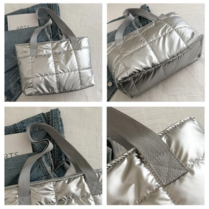 Detailansichten einer silbernen gesteppten Tragetasche mit Metallic-Finish und breitem Gurt