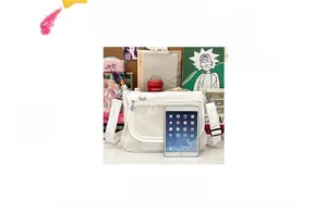 White canvas ita bag with clear PVC window and adjustable strap shown next to a tablet