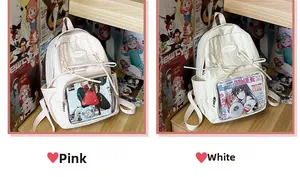 Close-up showing the pink and white color options of the ita bag with clear DIY window