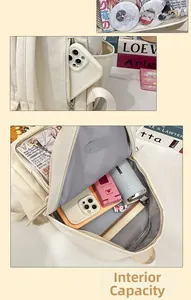 Detailed view of the spacious main compartment and transparent PVC front pocket for pins