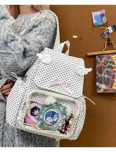 Polka dot backpack featuring a clear PVC display pocket with anime pins and plush wings