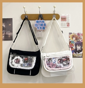 Detail showing black and white Ita Bags with lace trim and clear PVC windows