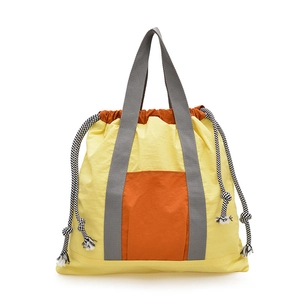 Versatile mustard and orange contrast drawstring backpack with large front pocket