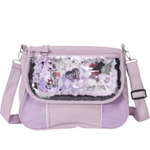 Detail of lavender ita bag featuring white lace trim and a clear heart display window