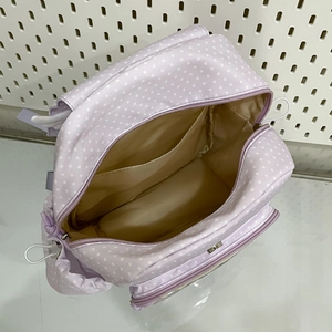 Cute lavender backpack with white polka dots and wing decor for teenage girls