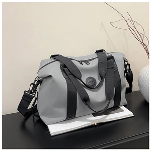 Close-up of grey large-capacity travel bag with black straps and LANWEIER logo