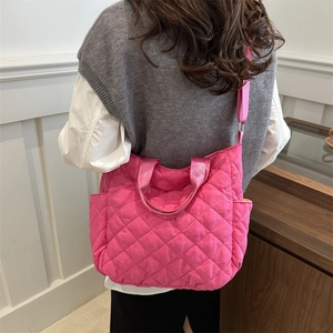 Large quilted rose red nylon tote bag with rhombus pattern and adjustable shoulder strap