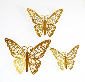 Detailed view of hollow rose gold butterfly wall stickers in three different sizes