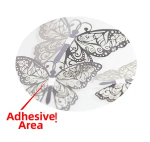 Detailed macro view showing the adhesive point of hollow 3D golden butterfly wall stickers