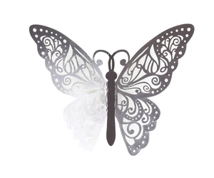 Detail of silver hollow butterfly wall sticker with intricate laser-cut mirror patterns